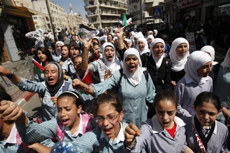 Palestinians school children rally Thursday in support of the bid for statehood recognition.